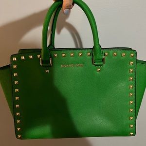 Green and gold studded like new tote.
